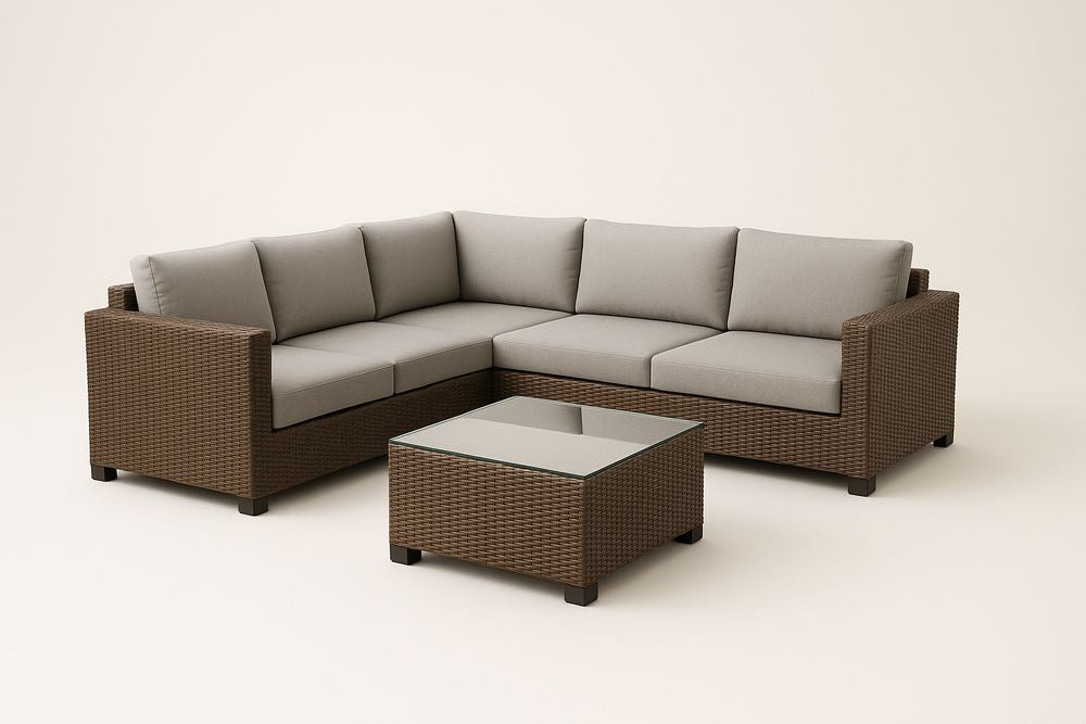 L Shaped Brown Resin Woven Sofa Set With Gray Cushions And Tempered Glass Coffee Table